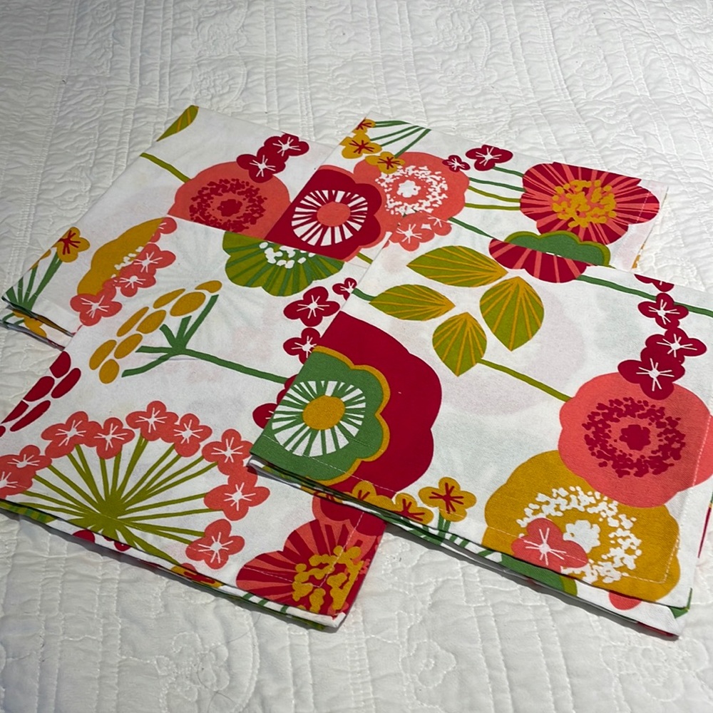Four colourful one hundred per cent heavy cotton napkins